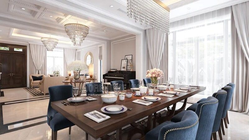 Trang trí phòng ăn liền phòng khách đẹp, sang trọng ấn tượng với sắc xanh nổi bật từ bộ bàn ghế cùng lối thiết kế nội thất tân cổ điển quý phái.