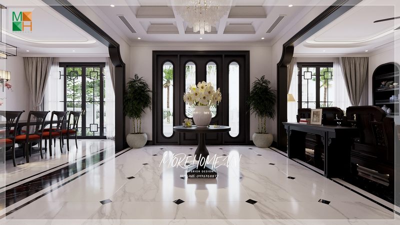 Bàn trang trí với tone màu tối mang đến sự hài hòa ấn tượng trong không gian sống của gia đình.