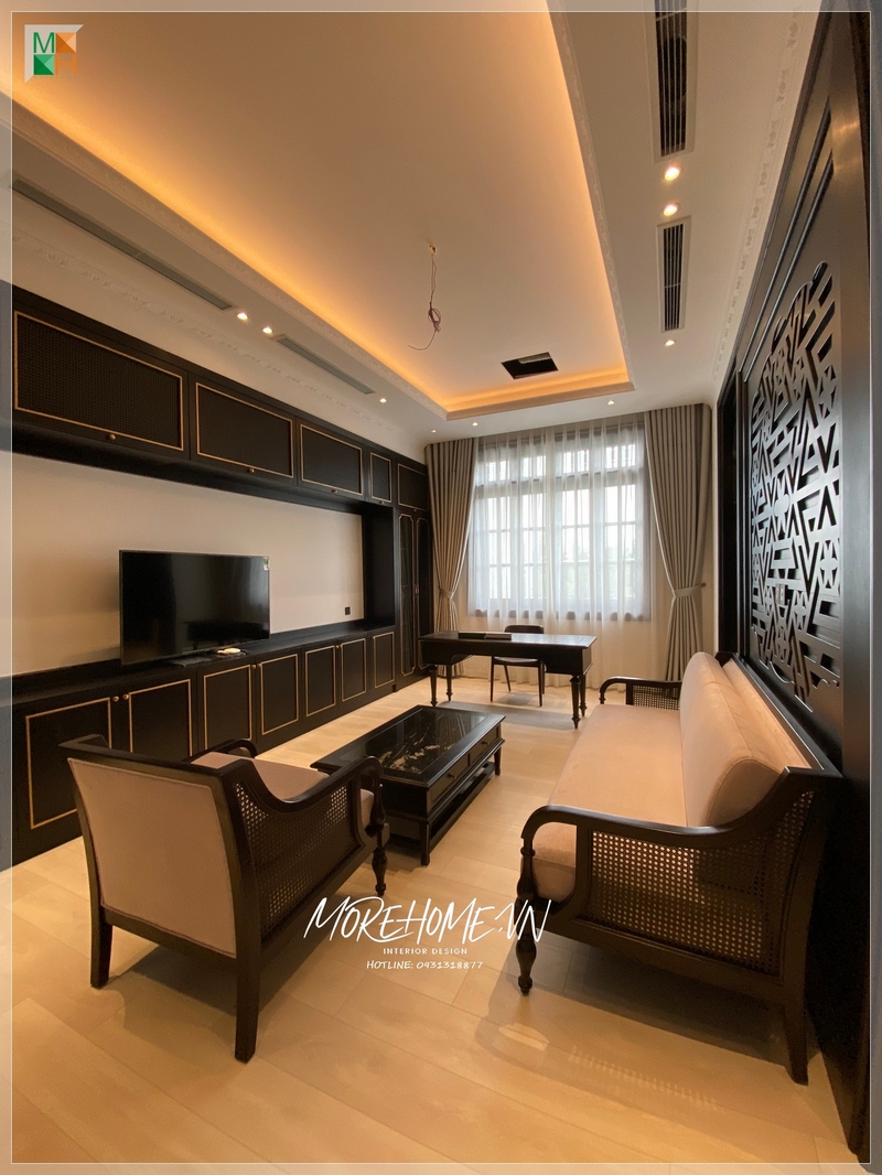 Thi công phòng khách phong cách indochine không gian đón tiếp khách chu đáo, thể hiện thẩm mỹ của không gian cũng như gia chủ